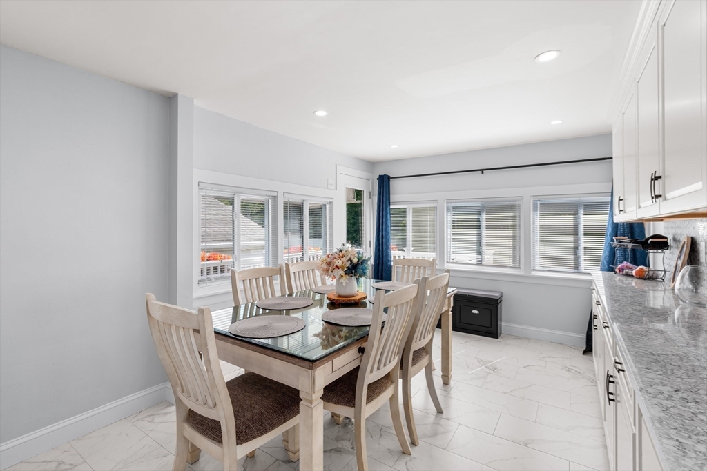 5 Albert Road Peabody, MA 01960 - Photo 10 of 39 a view of a dining room with furniture window and outside view