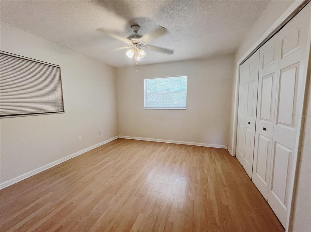 110 Willow Avenue Altamonte Springs, FL 32714 - Photo 6 of 8 a view of an empty room with wooden floor