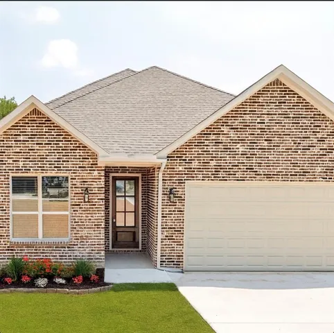 a front view of house with yard