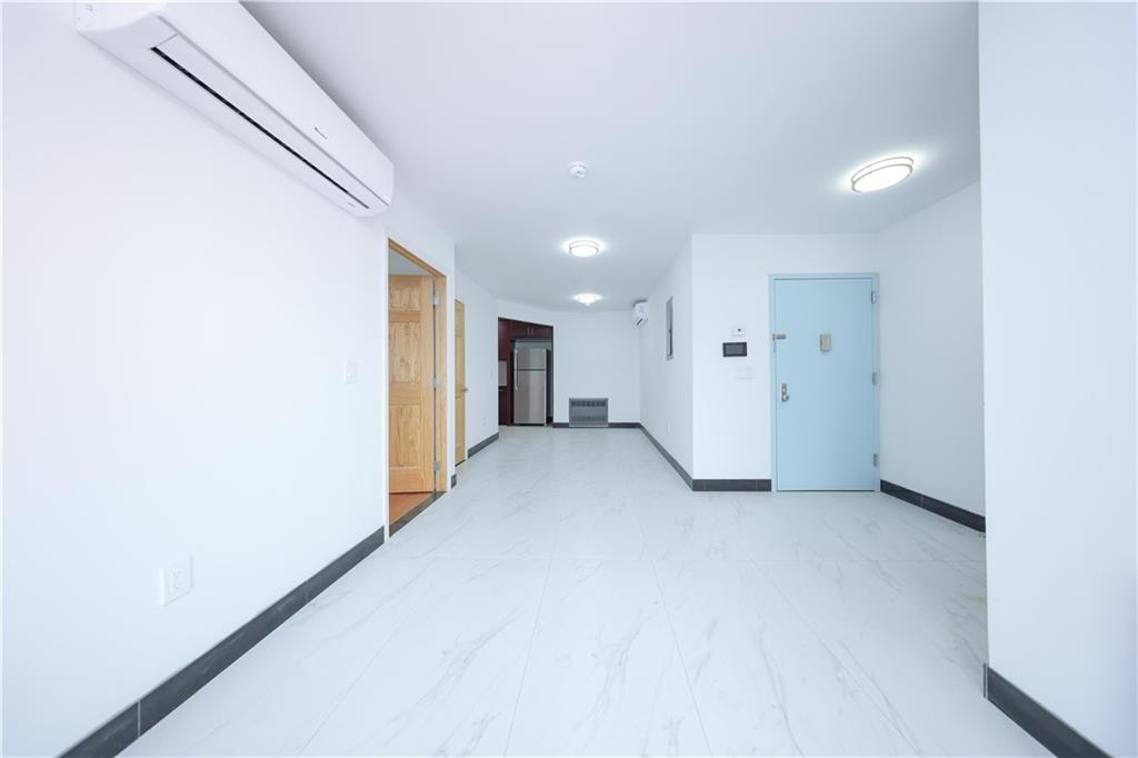 2837 West 19th Street, Unit 3A Brooklyn, NY 11224 - Photo 11 of 21 a view of a big room with closet and a window