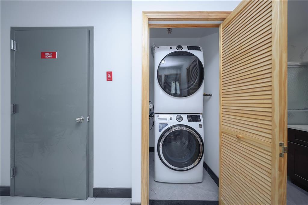 2837 West 19th Street, Unit 3A Brooklyn, NY 11224 - Photo 16 of 21 a utility room with dryer and washer