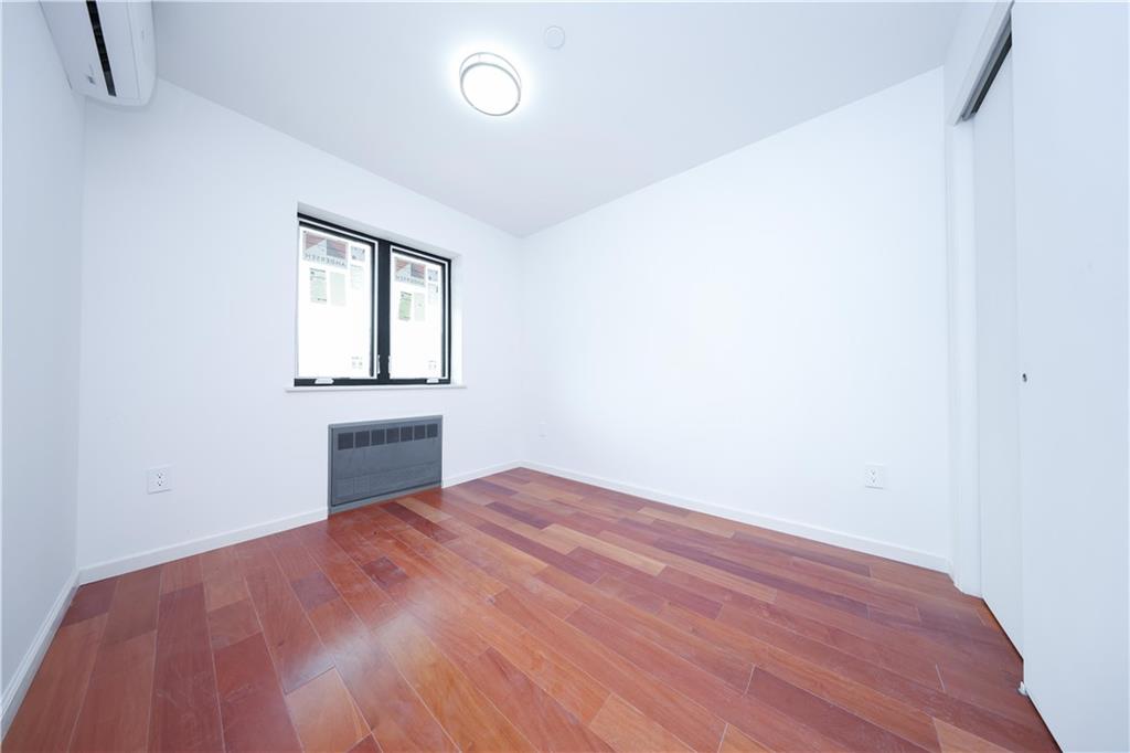 2837 West 19th Street, Unit 3A Brooklyn, NY 11224 - Photo 7 of 21 an empty room with windows