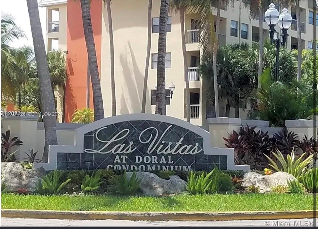 8180 Geneva Court, Unit 227 Miami, FL 33166 - Photo 10 of 11 a view of a street sign of the house
