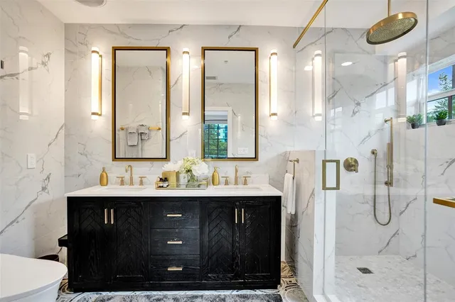 a balcony with furniture and a potted plant