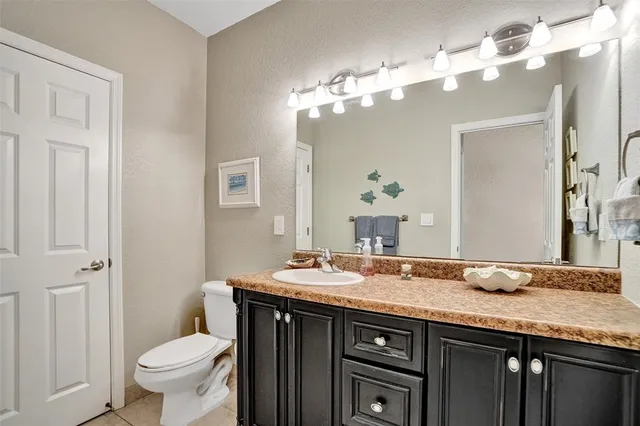 a view of a patio with couches and potted plants
