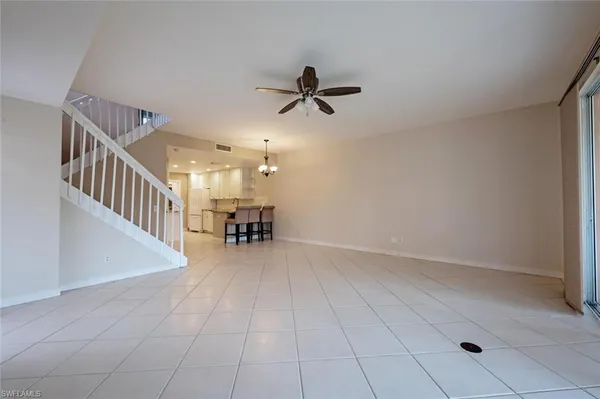 a view of a livingroom with a staircase