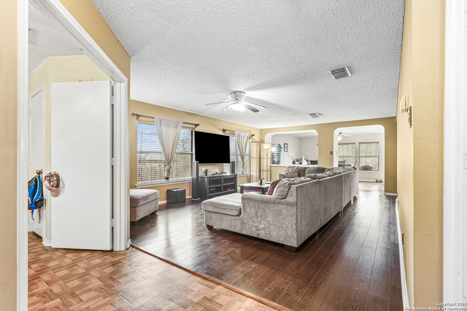7234 Raintree Forest San Antonio, TX 78233 - Photo 3 of 23 a living room with furniture and a flat screen tv