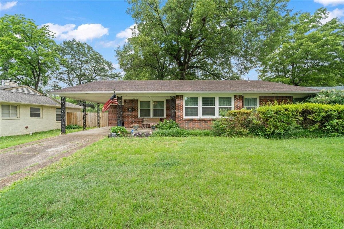 4841 Dee Road Memphis, TN 38117 - Photo 1 of 28 View of front of property featuring concrete driveway, an attached carport, and brick siding