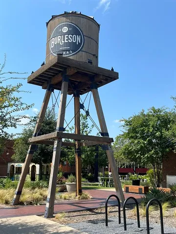 a view of a chairs and table in the patio