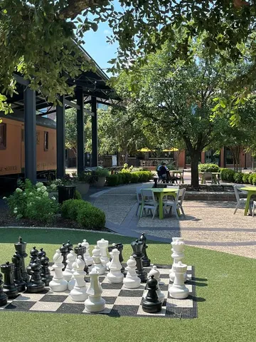 a view of a yard with patio