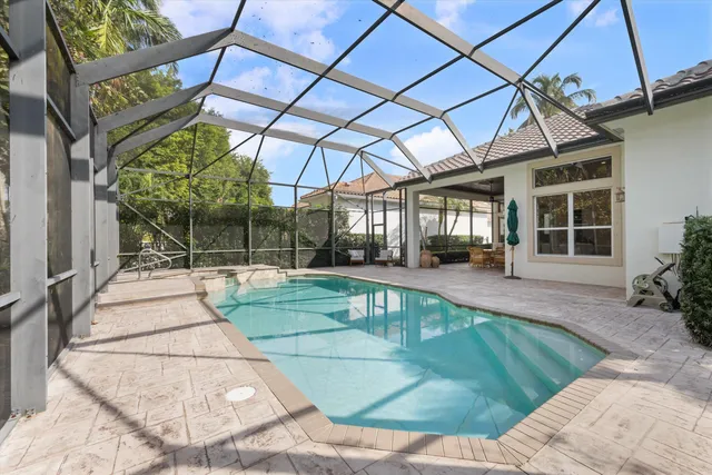 a view of indoor pool and sitting area