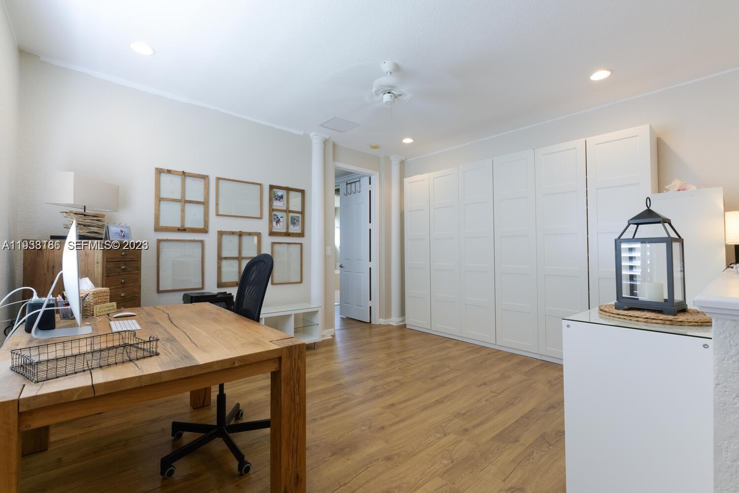 250 Southwest Walking Path, Unit 250 Stuart, FL 34997 - Photo 19 of 29 a view of a workspace with furniture