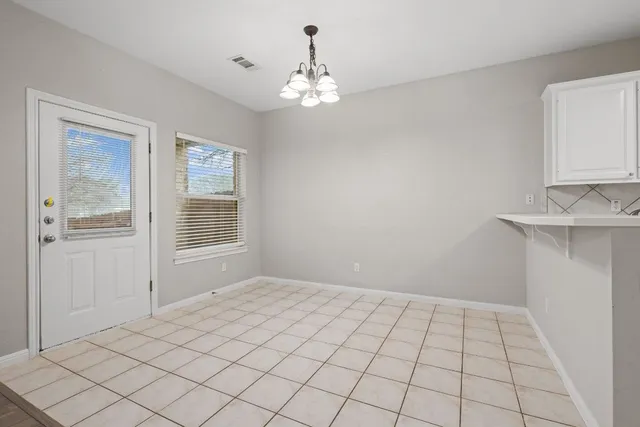 a view of an empty room with window