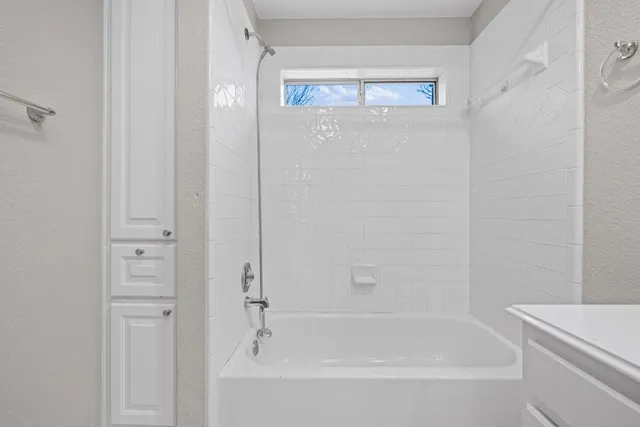 a bathroom with a bathtub