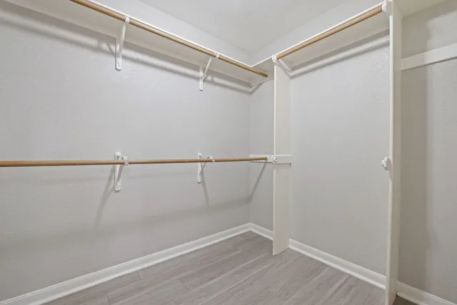 a view of a room with racks on the wall