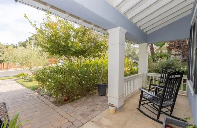 a view of a two chair in the patio