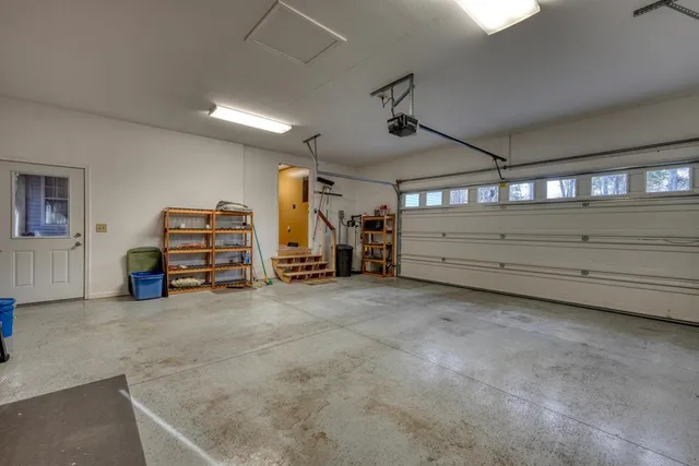 a view of room with air conditioner duct and materials on floor