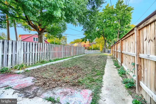 a view of backyard with green space