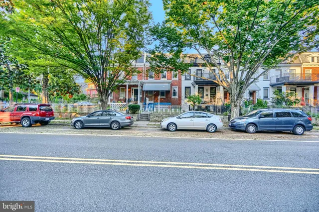 a view of a cars parked in front of a building