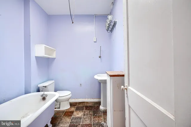 a bathroom with a sink and a toilet