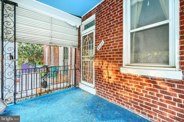 a view of a porch with a door