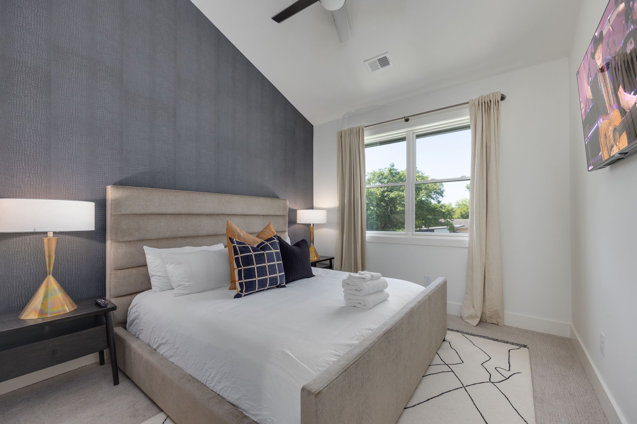 1007 Summit Avenue Nashville, TN 37203 - Photo 27 of 45 a bedroom with a bed and a window