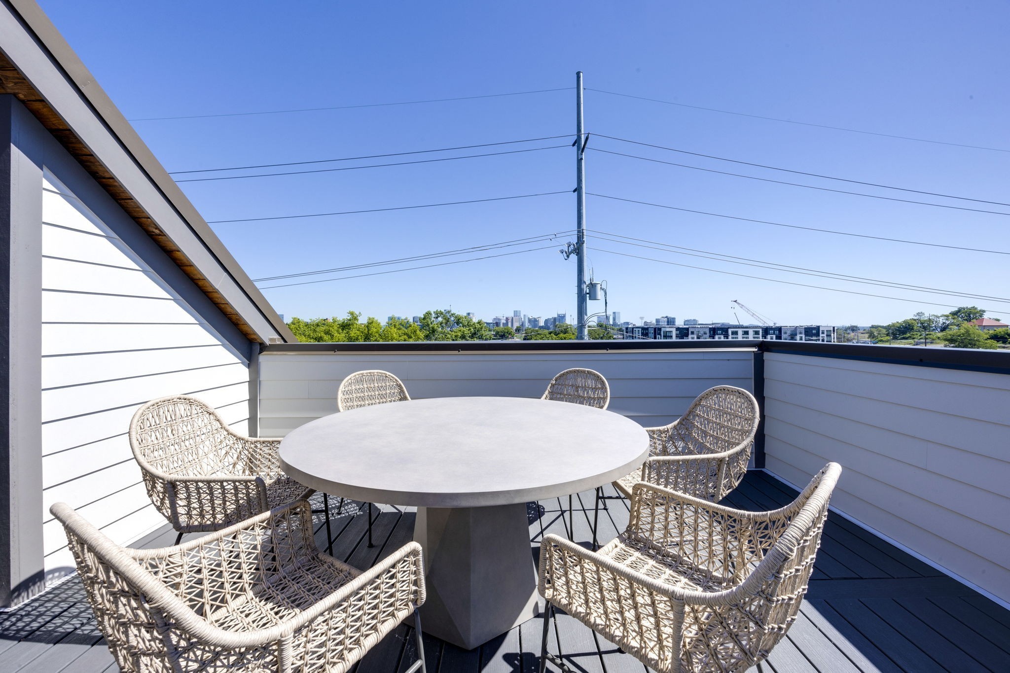 1007 Summit Avenue Nashville, TN 37203 - Photo 42 of 45 a table and chairs in a balcony