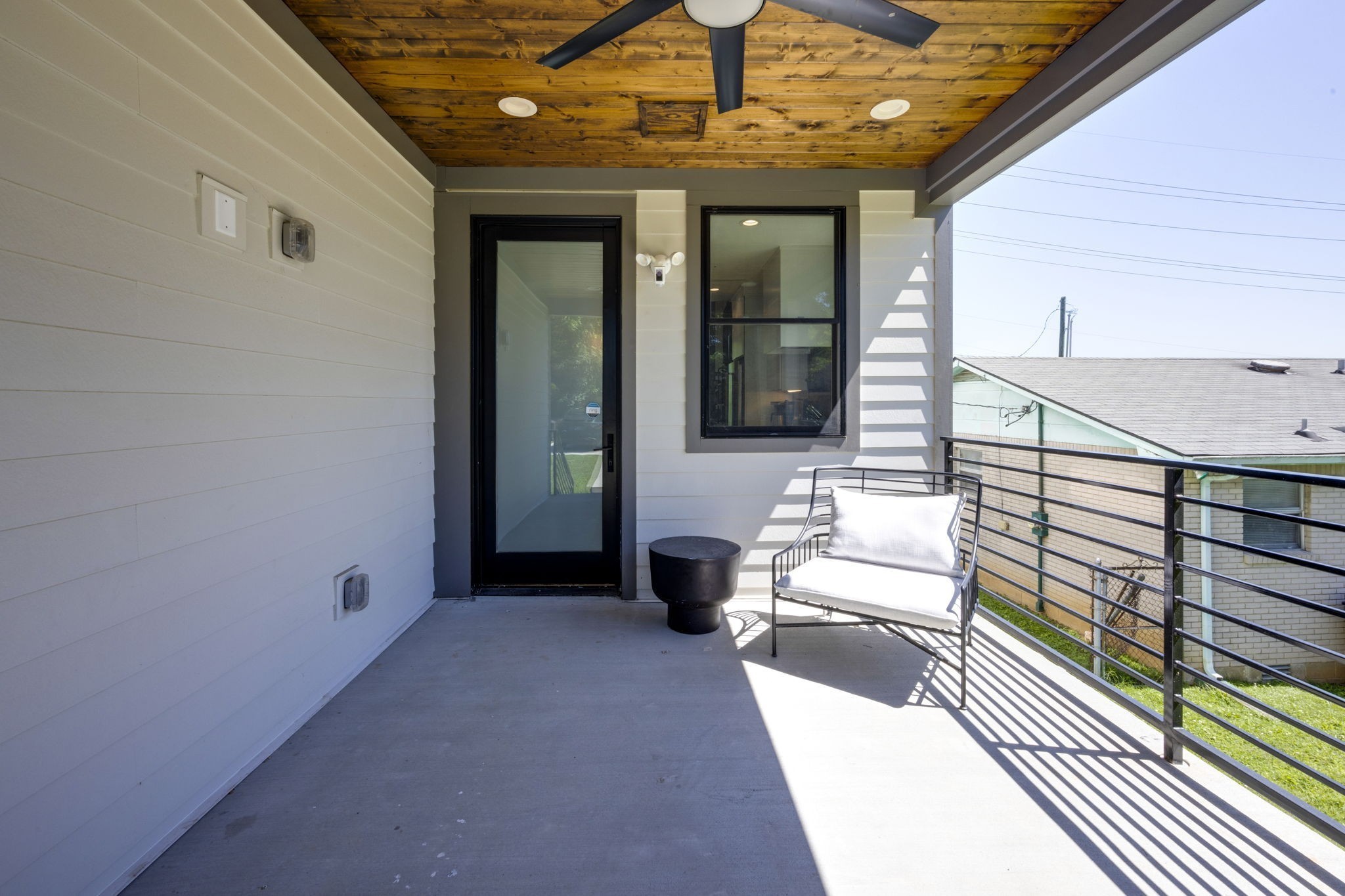 1007 Summit Avenue Nashville, TN 37203 - Photo 45 of 45 a view of a balcony with two couches and wooden floor