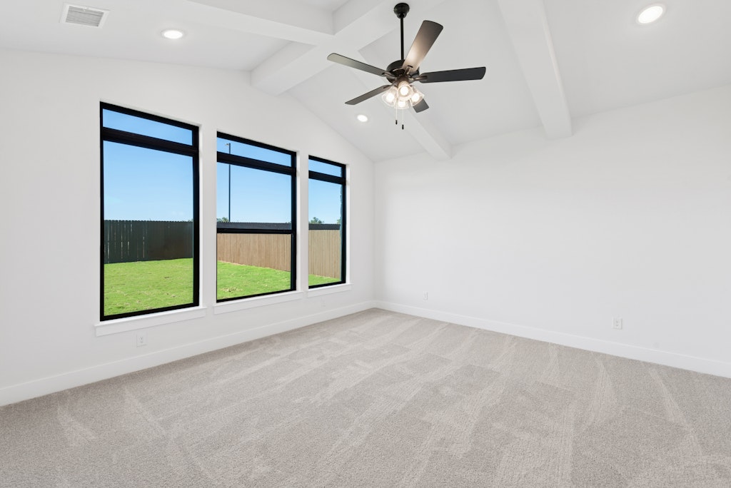 3408 Emerald Lake Path Georgetown, TX 78628 - Photo 18 of 38 an empty room with windows and fan