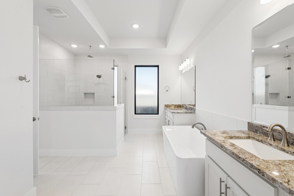 3408 Emerald Lake Path Georgetown, TX 78628 - Photo 21 of 38 a bathroom with a granite countertop sink mirror and double