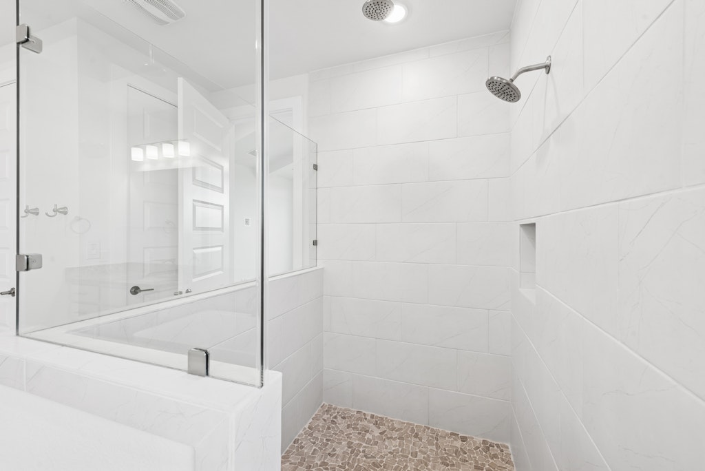 3408 Emerald Lake Path Georgetown, TX 78628 - Photo 23 of 38 a bathroom with a shower
