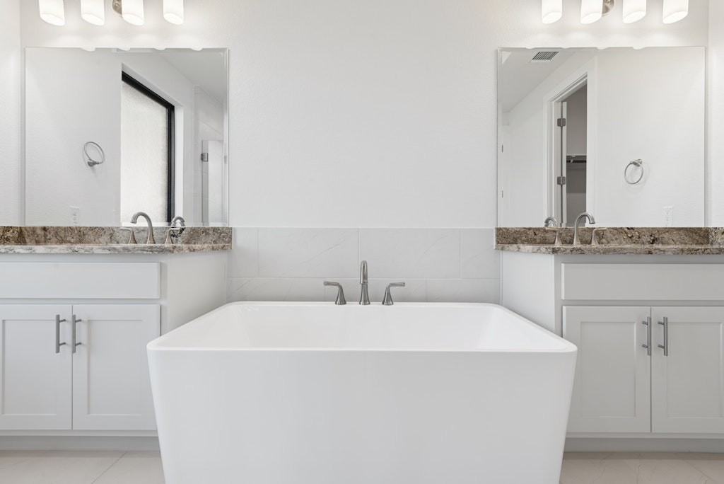 3408 Emerald Lake Path Georgetown, TX 78628 - Photo 24 of 38 a bathroom with a sink and a mirror