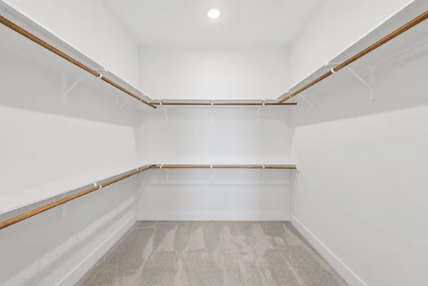 a view of an empty walk in closet