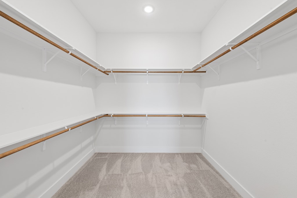 3408 Emerald Lake Path Georgetown, TX 78628 - Photo 25 of 38 a view of an empty walk in closet