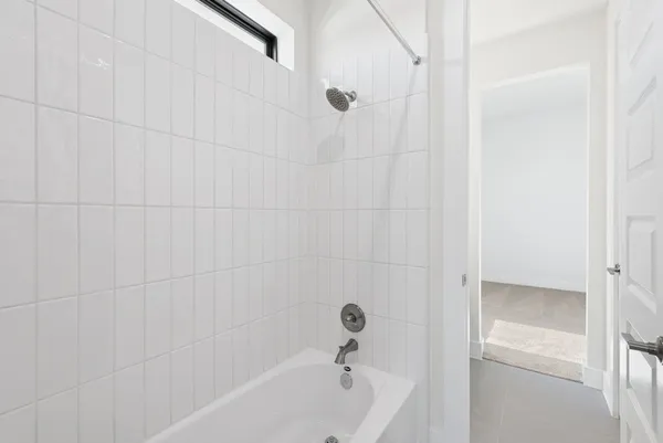 a bathroom with a bathtub