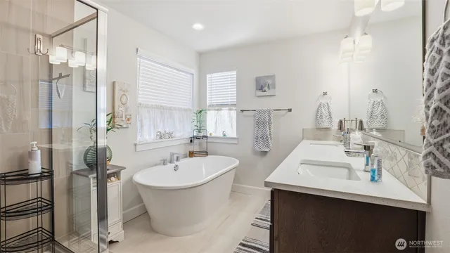 a view of a livingroom with workspace and a couch