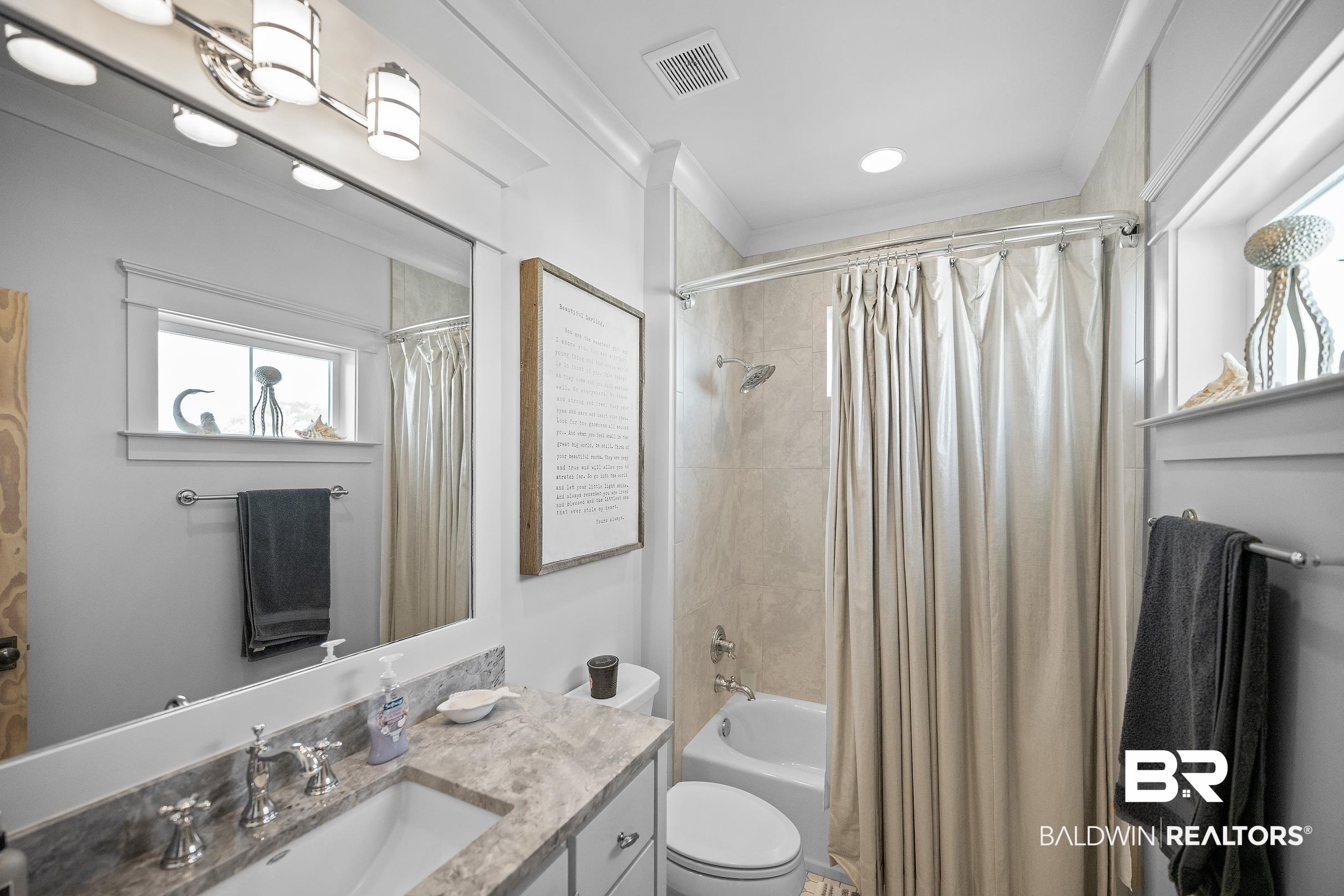 33186 Marlin Key Drive Orange Beach, AL 36561 - Photo 62 of 87 Full bath with vanity and shower / tub combo with curtain