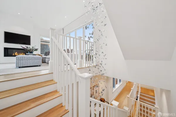 a en suite bathroom with a toilet sink and mirror