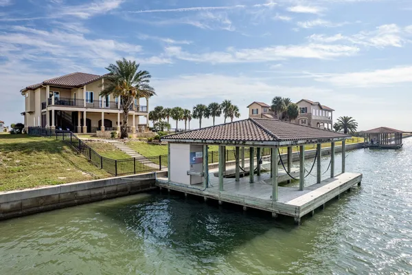 a view of a lake with a house