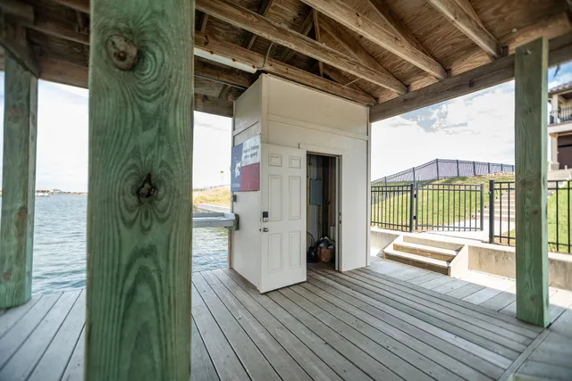 a view of front door and deck of the house