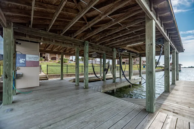 a view of a porch with wooden floor