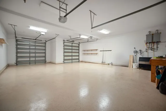 a view of a livingroom with furniture and staircase
