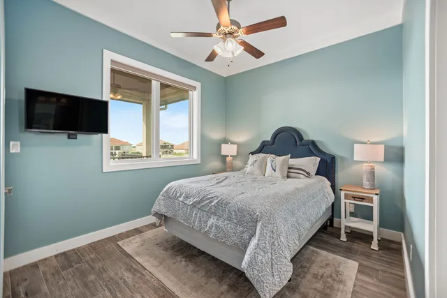 a kitchen with a refrigerator sink and cabinets
