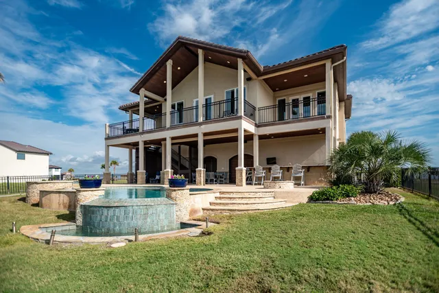 a front view of a building with garden