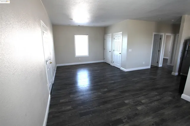 a view of a room that has a window in it