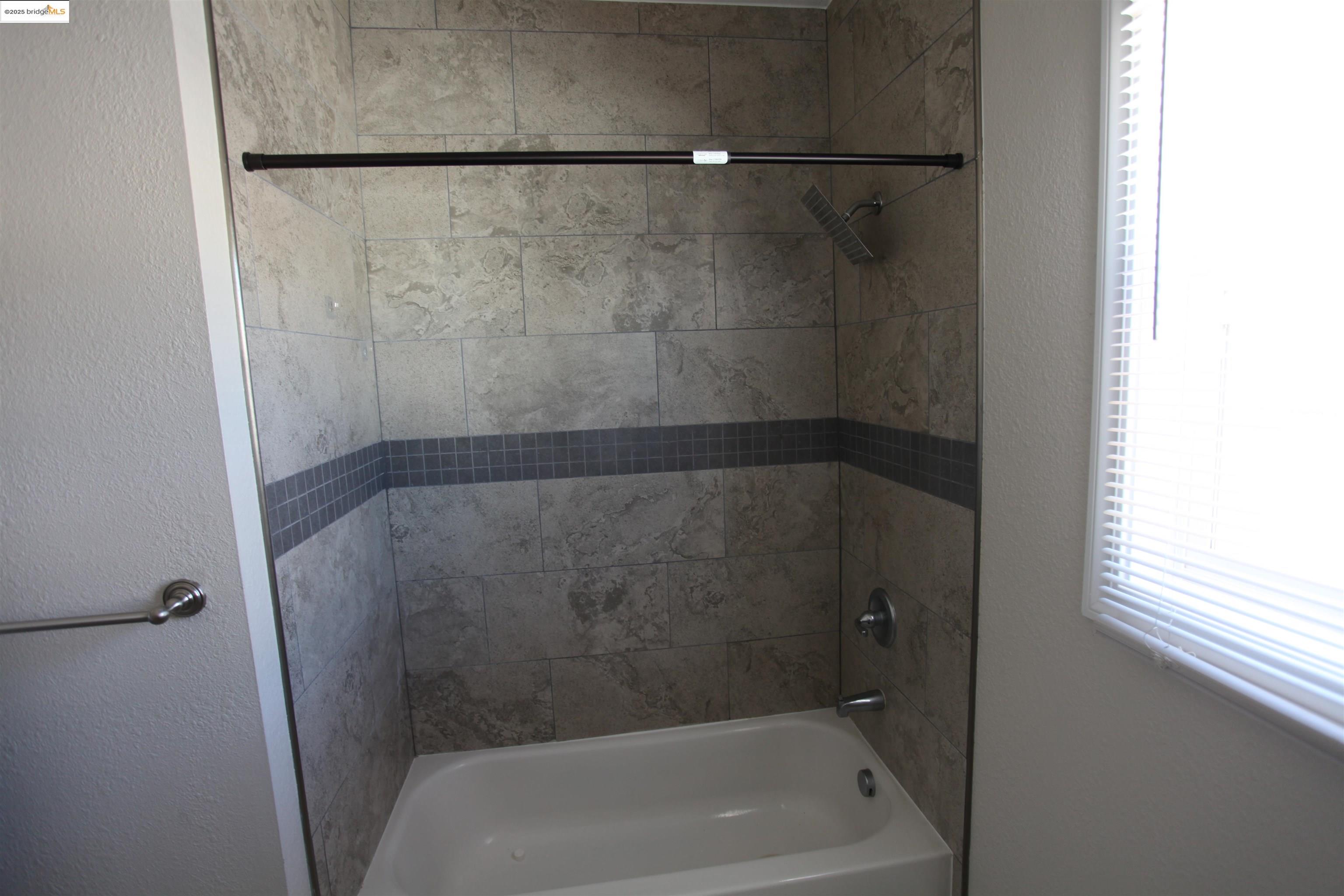 50 Main Street Isleton, CA 95641 - Photo 54 of 59 a close view of a bathtub in bathroom