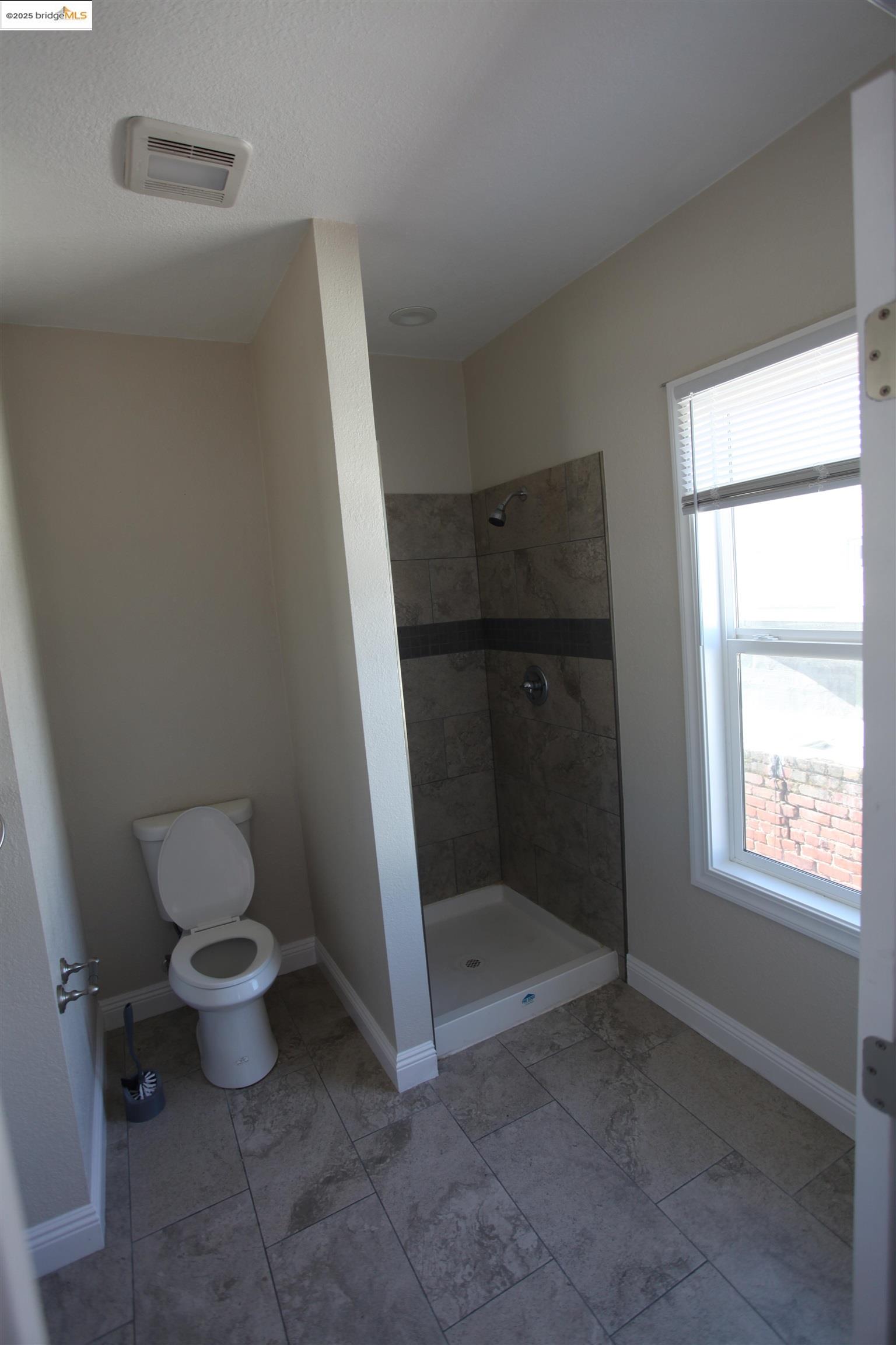 50 Main Street Isleton, CA 95641 - Photo 58 of 59 a bathroom with a toilet
