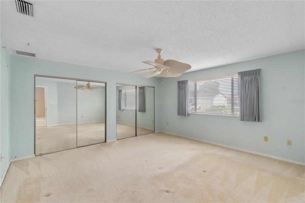 8156 Southwest 108th Ln Road Ocala, FL 34481 - Photo 23 of 50 a view of an empty room with a window