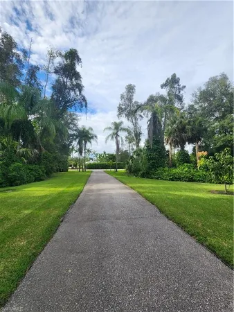 a view of a back yard of the house