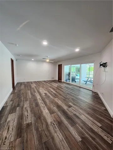 a kitchen with stainless steel appliances granite countertop wooden cabinets a sink and a stove